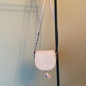 Victoria’s Secret studded flap purse.